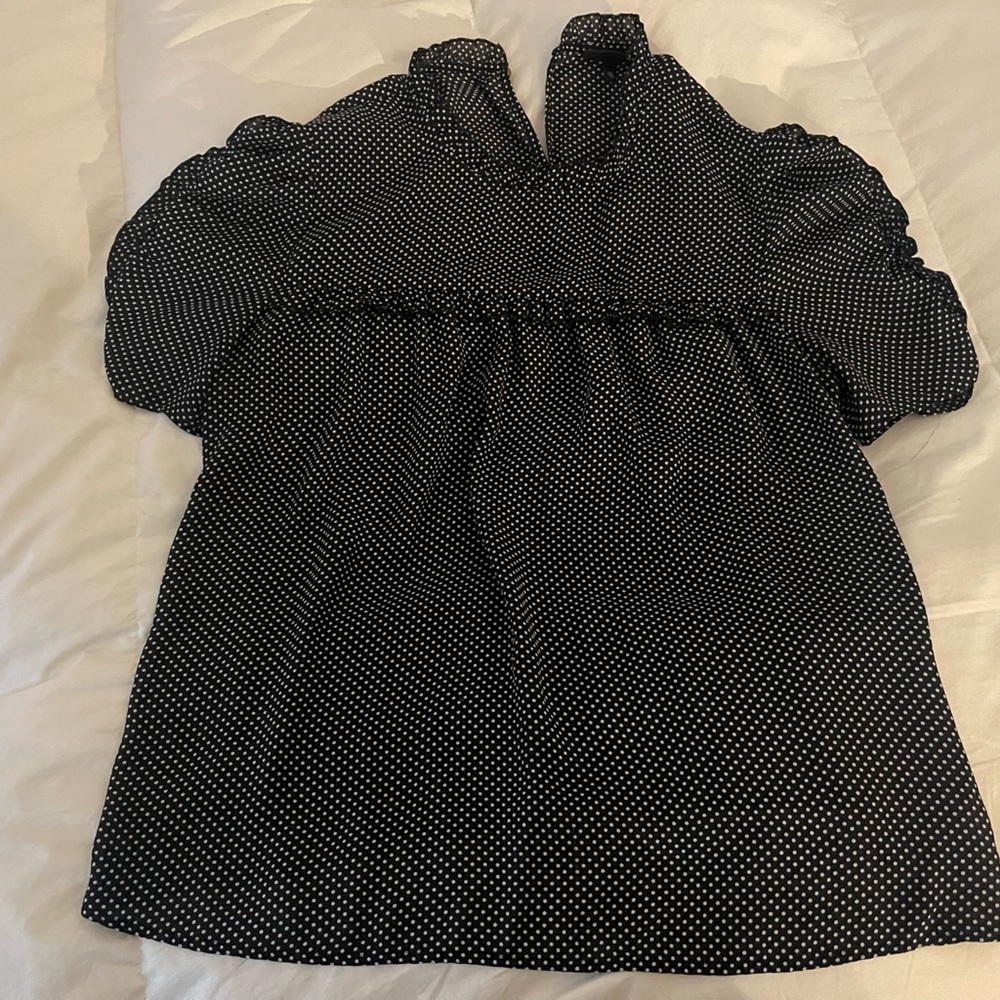 Black polka dot ruffle blouse. Who What Wear.